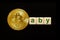 Word Baby made up of cubes. The first letter of the word is symbolized by a bitcoin coin.