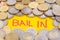 Word Bail-in, and coins around.