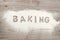 Word baking written in flour