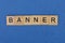 Word banner of brown wooden letters