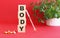 The word BODY is made of wooden cubes on a red background. Medical concept