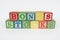The Word Bonds and Stocks in Wooden Childrens Blocks