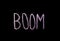 Word `boom`  drawned on chalkboard