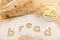 Word bread written in flour bread and butter
