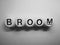 Word broom on wooden dice