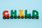 Word child made of letters train alphabet. Bright colors of red yellow green and blue on a white background. Early childhood educa