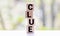 word clue on white toy cubes