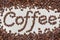 The word coffee is made of coffee beans.On a white background. copy space word  coffee