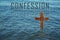 Word Confession near wooden Christian cross in water