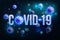 The word COVID-19 with Coronavirus icon and Virus background with disease cells