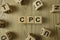 Word cpc from wooden blocks on desk