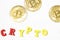 Word crypto with bitcoin coins on white background