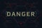 The word danger on a futuristic background