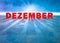 The word December in German language on an abstract background