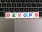 Word DevOps on keyboard background