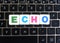Word Echo on keyboard background