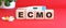 The word ECMO is made of wooden cubes on a red background. Medical concept