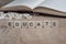 Word educate written with cube letters on wooden background