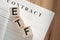 Word ETF -Exchange Traded Fund, on wooden cubes on contract documents background