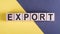 Word EXPORT on wooden cubes on yellow - gray background