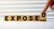the word of EXPOSED on building blocks concept