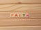 Word Faith on wood