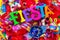 The word `fiesta` written in colorful foam letters on multicolored mash decorated with glitter and small sombrero