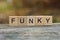 Word funky made of wooden letters