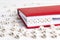 Word Gallery written in wooden blocks in red notebook on white w