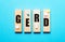 The word GERD is written on wooden blocks near the pills on a blue background. Medical concept