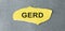 word GERD written on a yellow piece