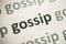 Word gossip printed on paper macro