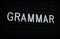 The word Grammar on a Letter Board