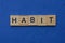 Word habit made from brown wooden letters