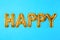 Word HAPPY made of golden foil balloon letters on blue background