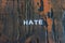 The word hate written in white block letters