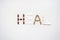 The word heal spelled out from different types of medical pills and capsules set of bright white background