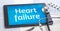 The word Heart failure on the display of a tablet