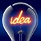 The word idea light bulb inside