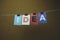 The word IDEA written on colorful note papers on board background. Idea concept