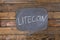 Word, inscription LITECOIN written in chalk on a blackboard made in the form of thought