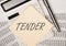 Word inscription tender on paper over calculator on office desk with documents, top view