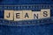 Word jeans made of wooden letters