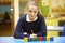 Word Learning Spelt In Wooden Blocks With Pupil Behind