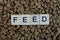 word lies on brown dry animal feed