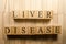 The word liver disease was created from wooden cubes. Health and life. Close up.
