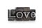 The word LOVE in letterpress type