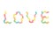 Word LOVE made from gummy worms on white