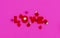 The word Love is made up of red letters on a pink background. Valentine's Day lovers concept