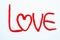 Word `Love` make from red Plasticine.